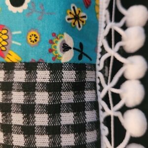 Floral and Checkered Pillow with Pom Poms